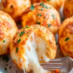 Gooey Mozzarella Biscuit Bombs – Cheesy Snack Delight