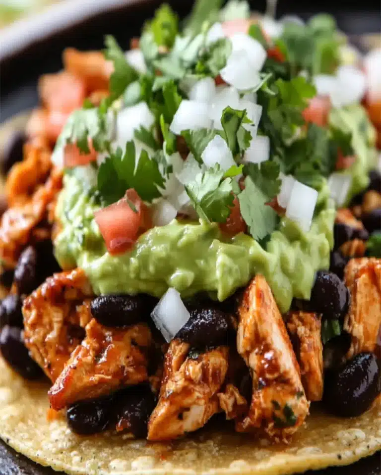 Spicy Chicken Tostadas with Black Beans & Avocado Cilantro Sauce