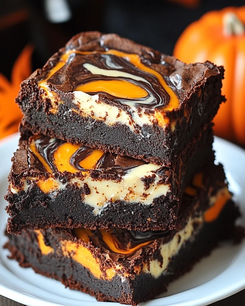 Halloween Pumpkin Cheesecake Brownies | Spooky Treats