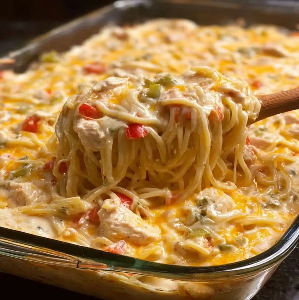 Spaghetti Chicken Casserole | Creamy Family Dinner Idea 5 Cheesy spaghetti chicken casserole with bell peppers and creamy sauce baked in a glass dish