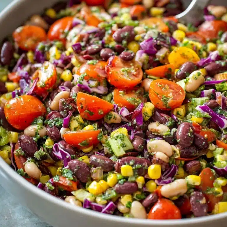 Colorful vegetarian bean salad with red cabbage, corn, kidney beans, and cherry tomatoes
