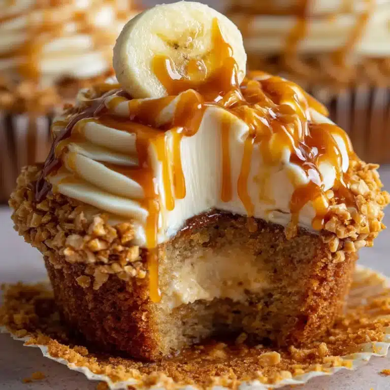 Banana cheesecake cupcakes with cream cheese frosting and caramel drizzle