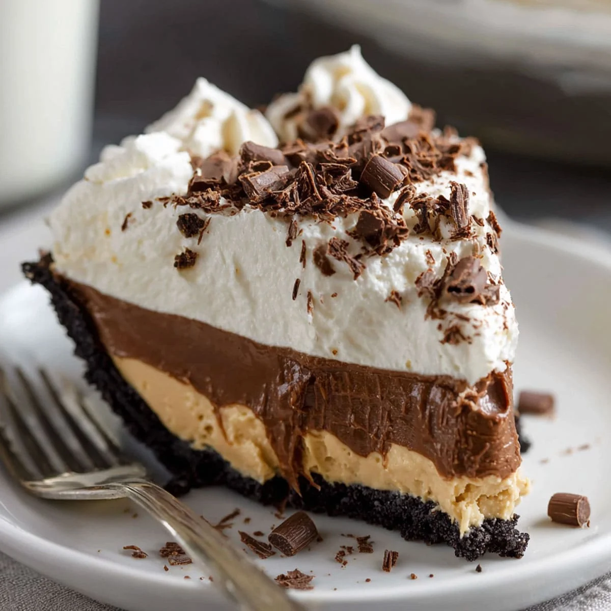 Close-up bite of creamy No Bake Peanut Butter Pie with Oreo crust