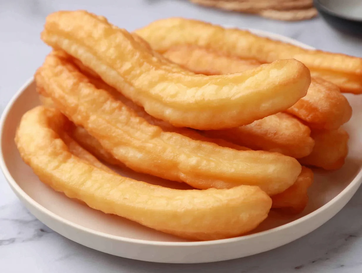Chinese Doughnut Sticks Recipe | How to Make Youtiao Easily 10 Beautifully served on a plate, ready to enjoy